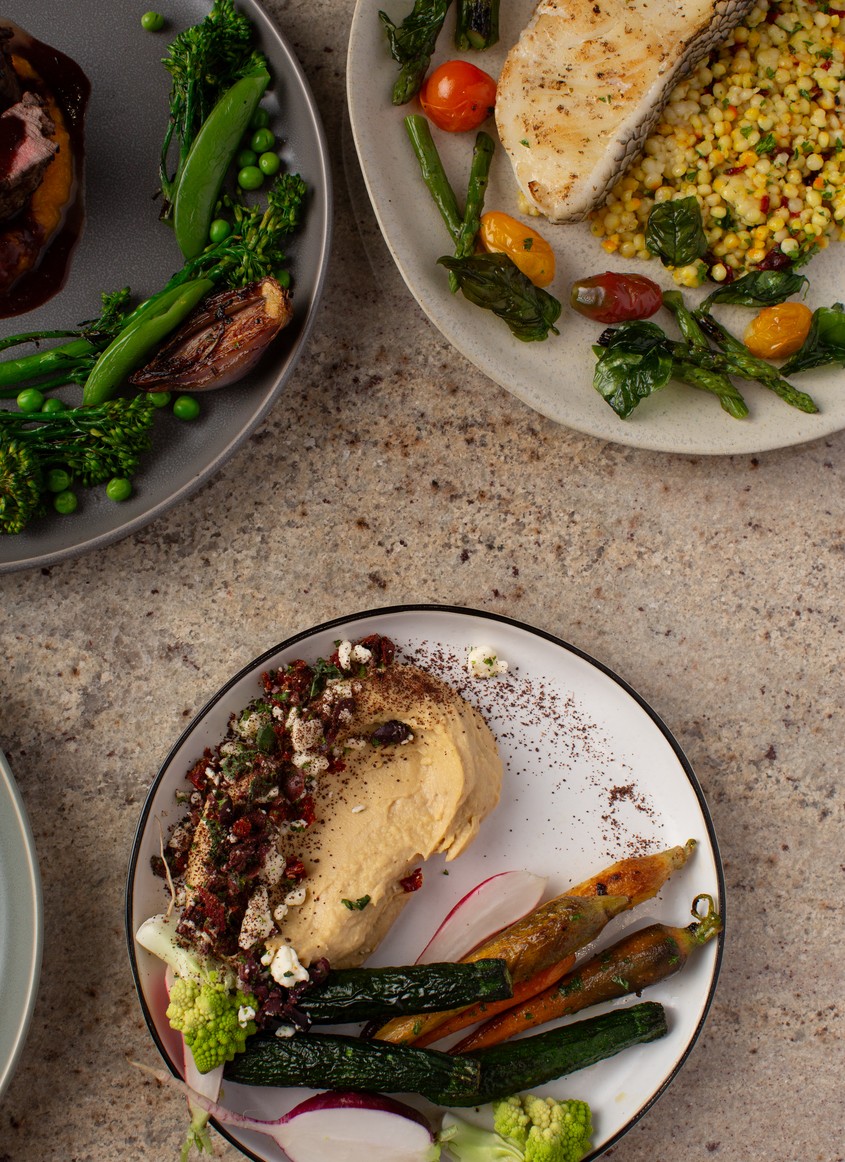Three finished dishes by Chef Rosie Sanchez.