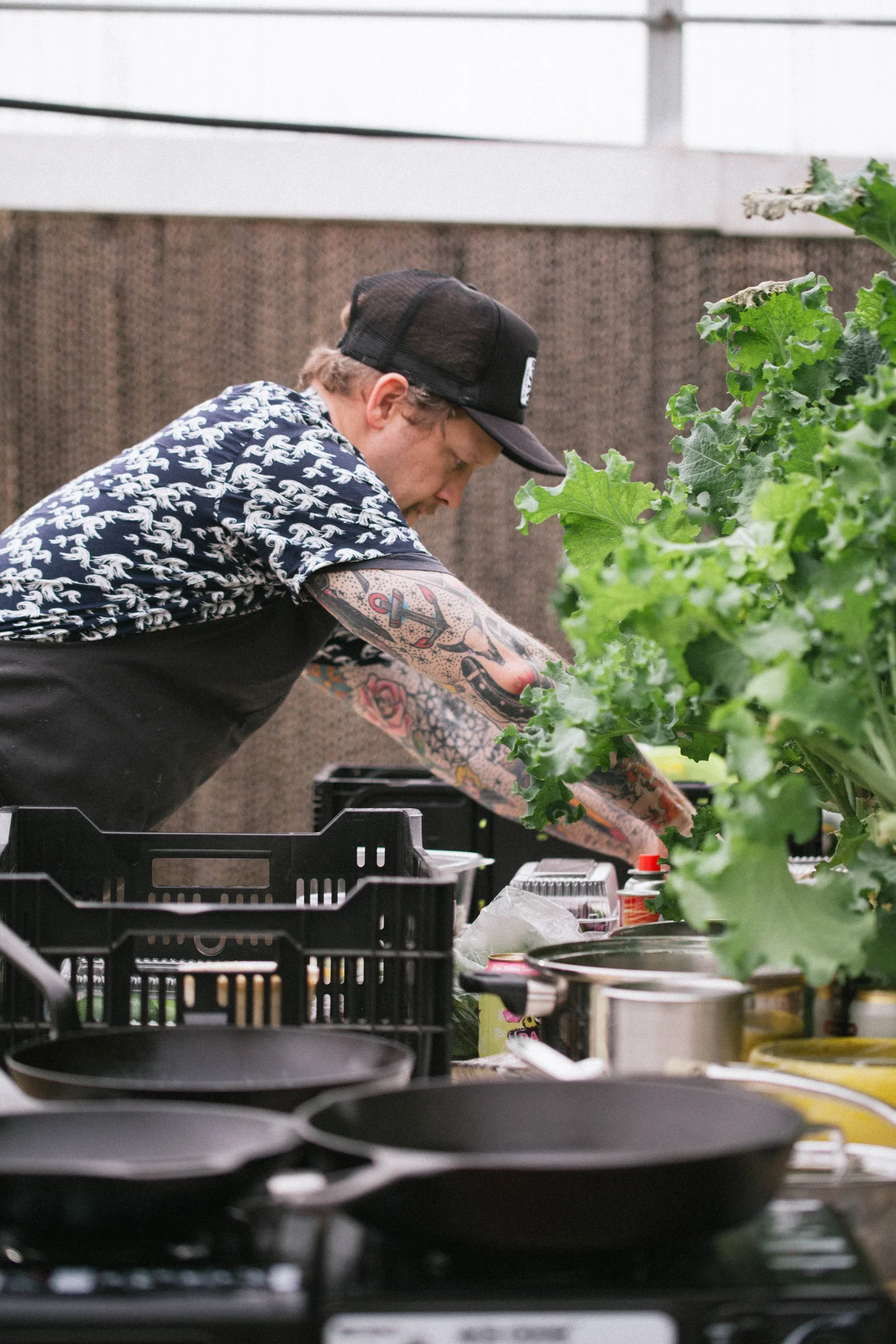 Travis Wyatt cooking at Greenhouse Dinner