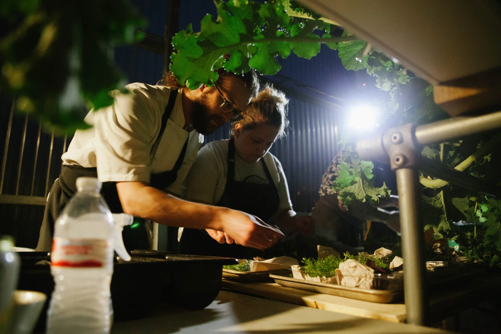 Josh Sutcliff and Travis Wyatt preparing Greenhouse Dinner