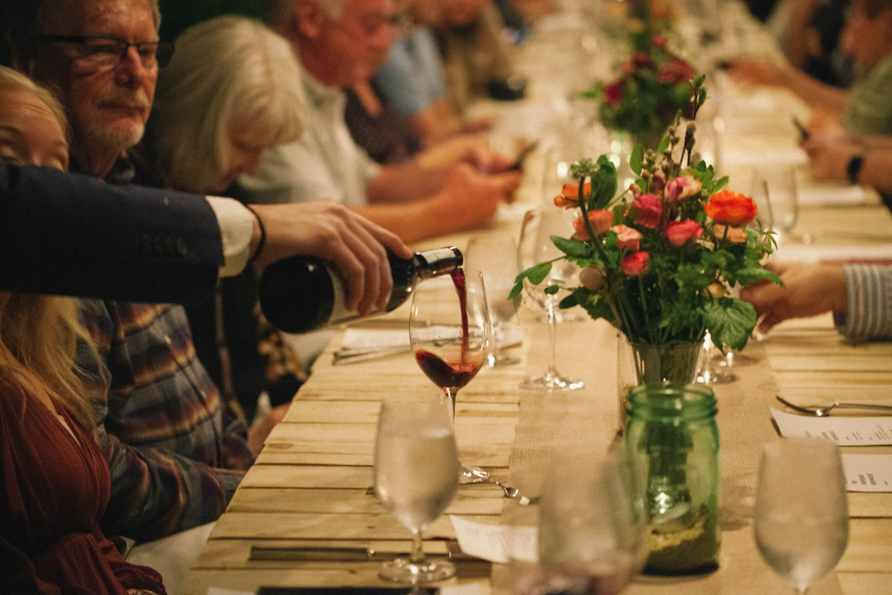 Wine service along the table.