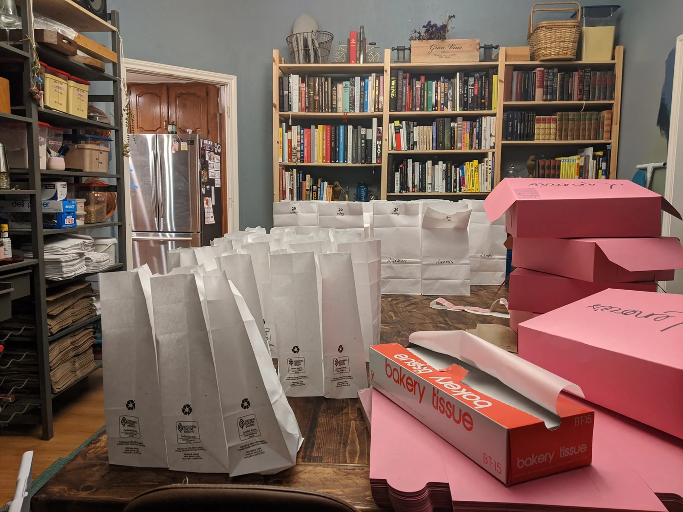 Bags and pink boxes taking over the room · September 2020