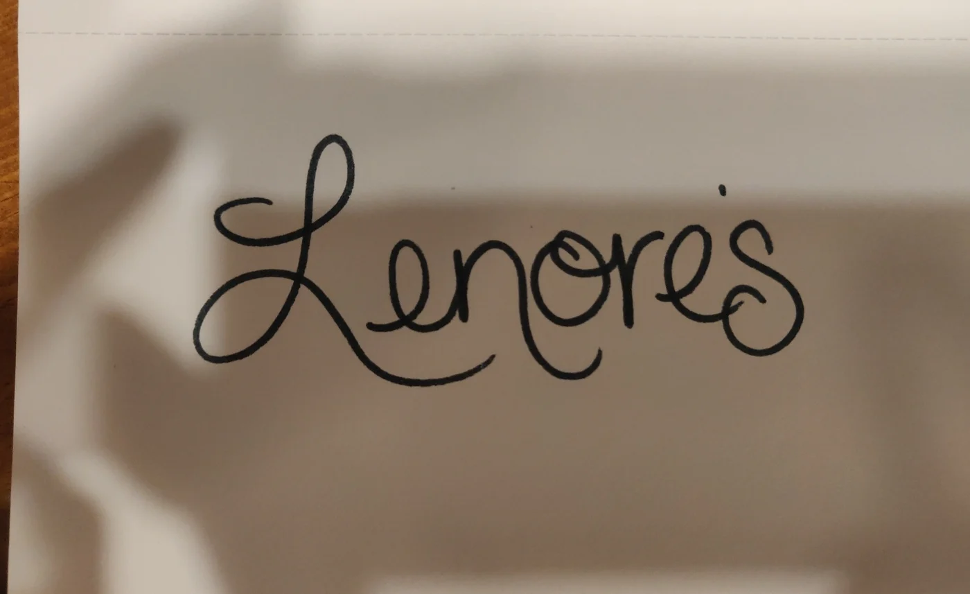 Exploring the handwritten name.