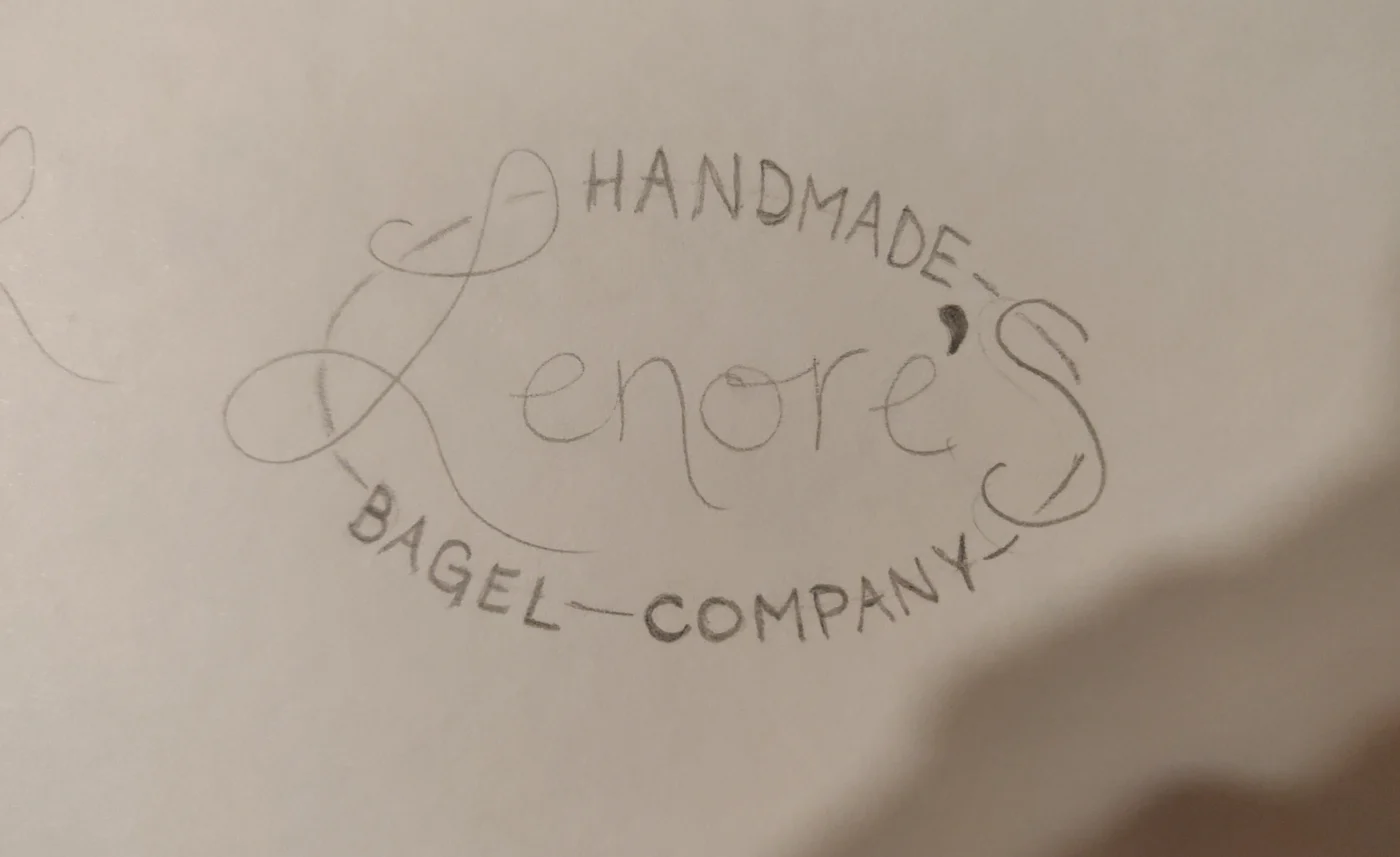 A pencil layout for the circular mark.