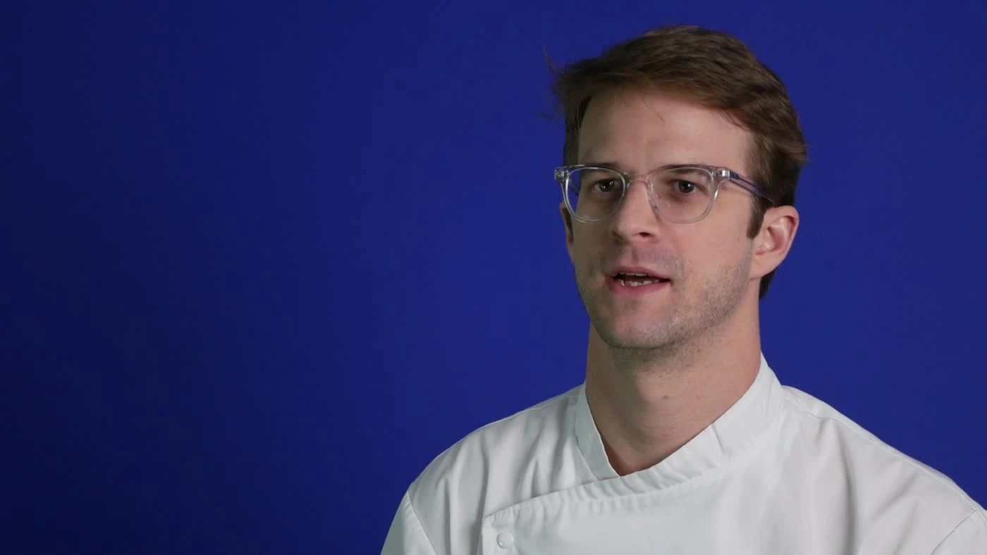 Josh Sutcliff in a chef coat during the filmed interview shoot.