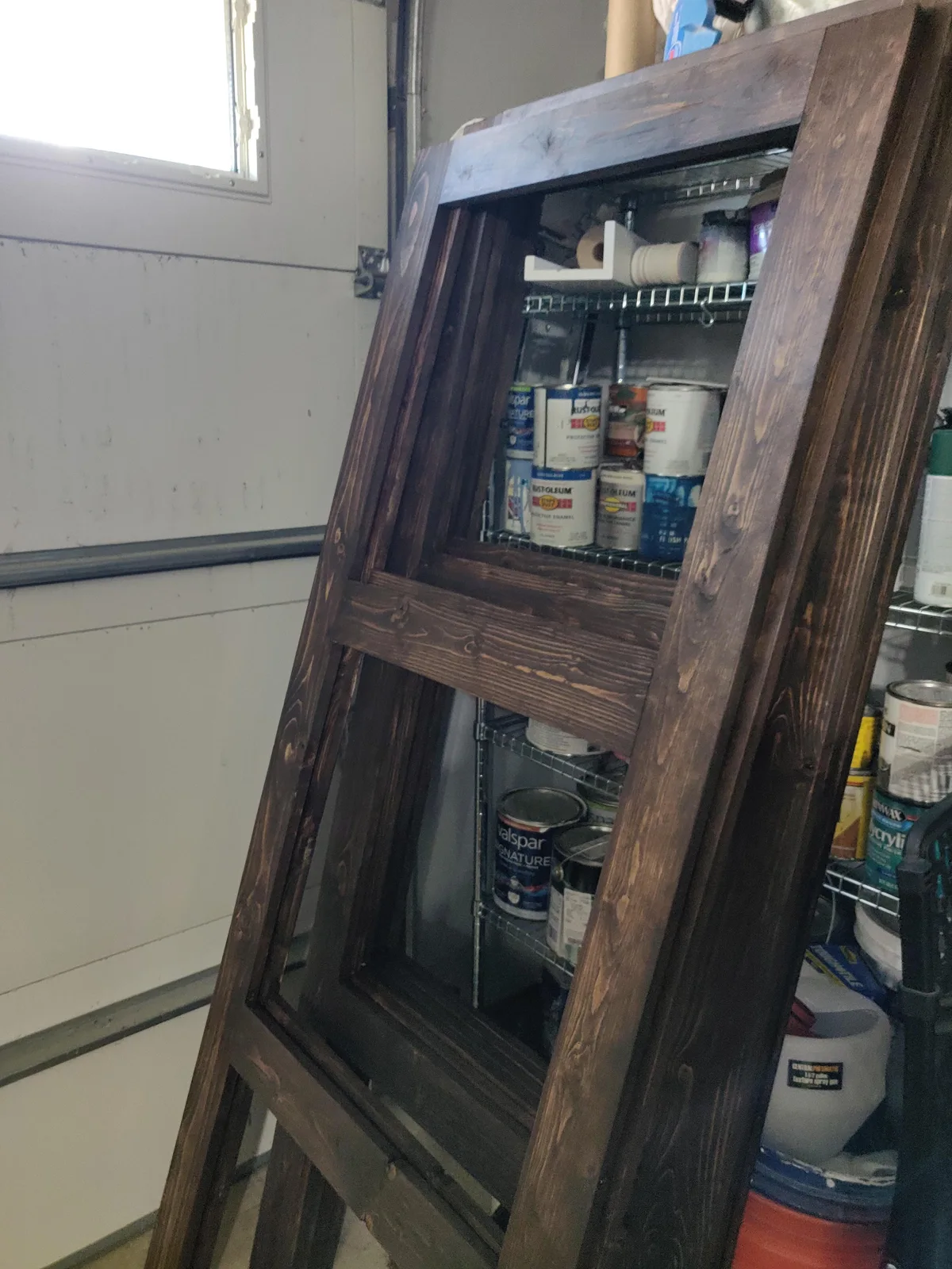 Detail of the stained wooden frames before assembly.